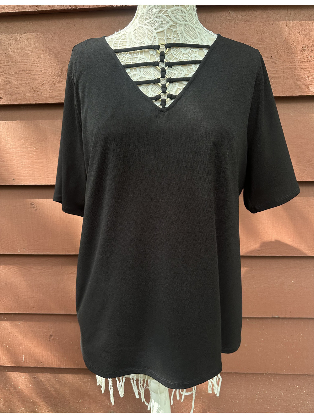 Bold Elements Black Cut to Curve V Neck Top
